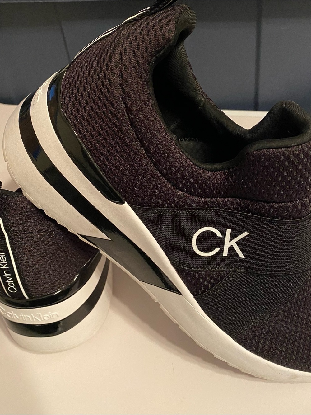 Calvin Klein Men's Black Slip-On Knit Sneakers with White Sole